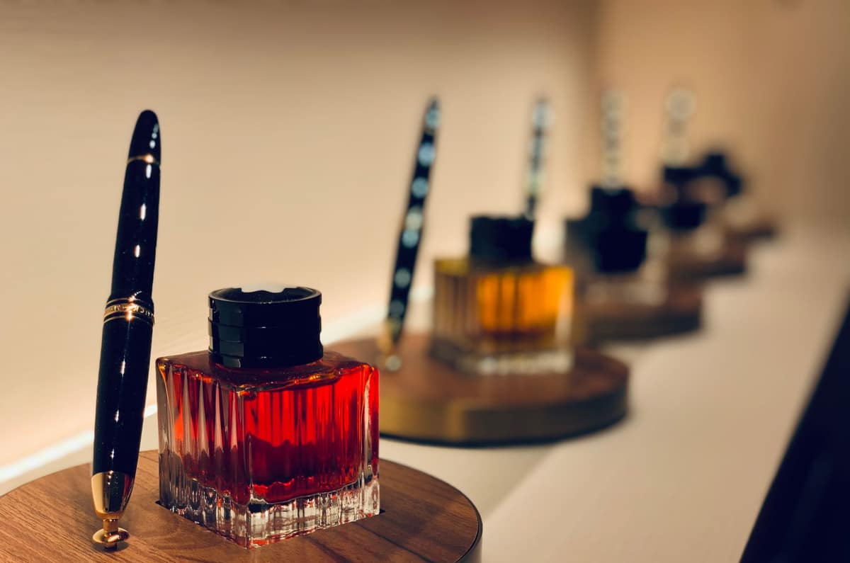 A clear fountain pen showing the ink inside its barrel