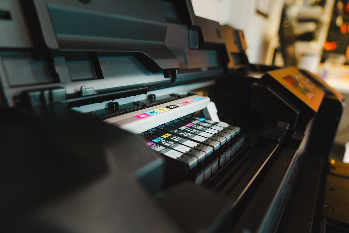 Small ink cartridges among stationery
