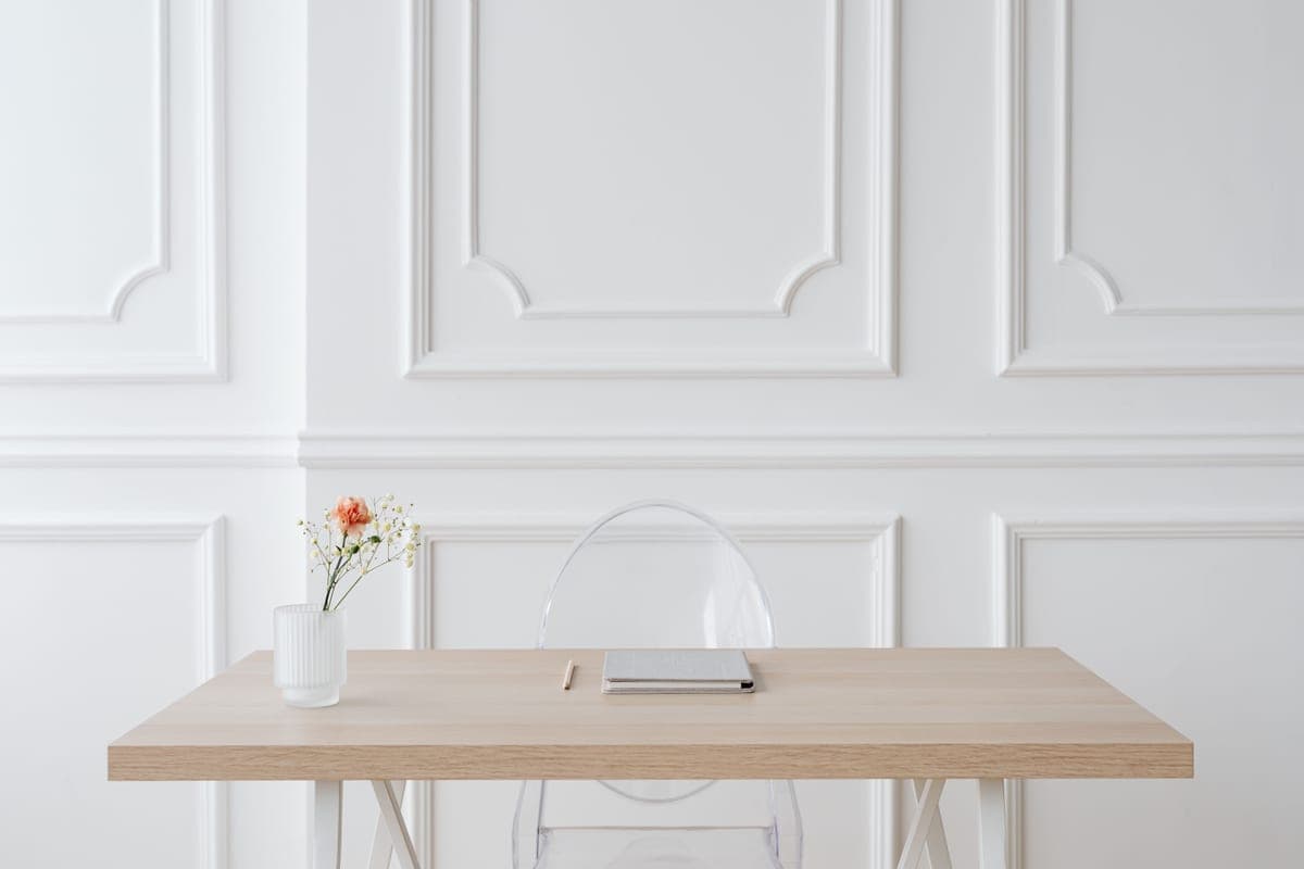 A minimal notebook on a wooden table