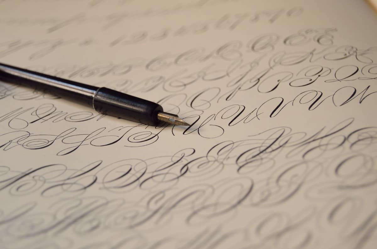 A fountain pen lying on a sheet of writing paper