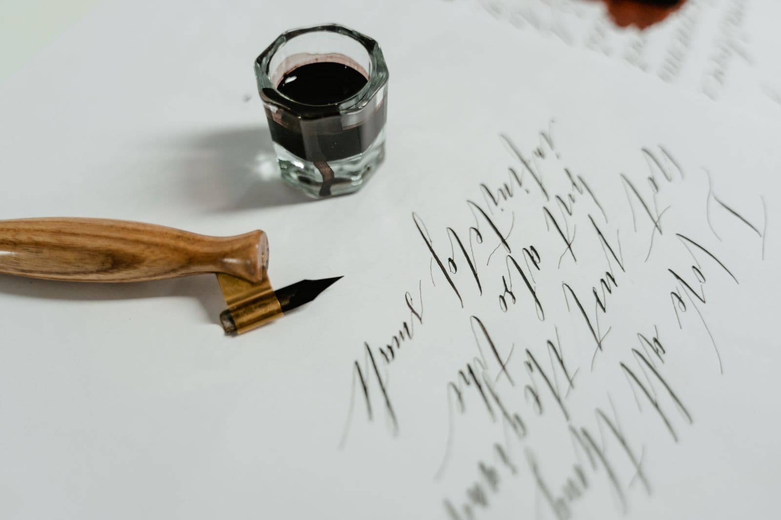 Close-up of handwriting made with a fountain pen, showing thick and thin strokes